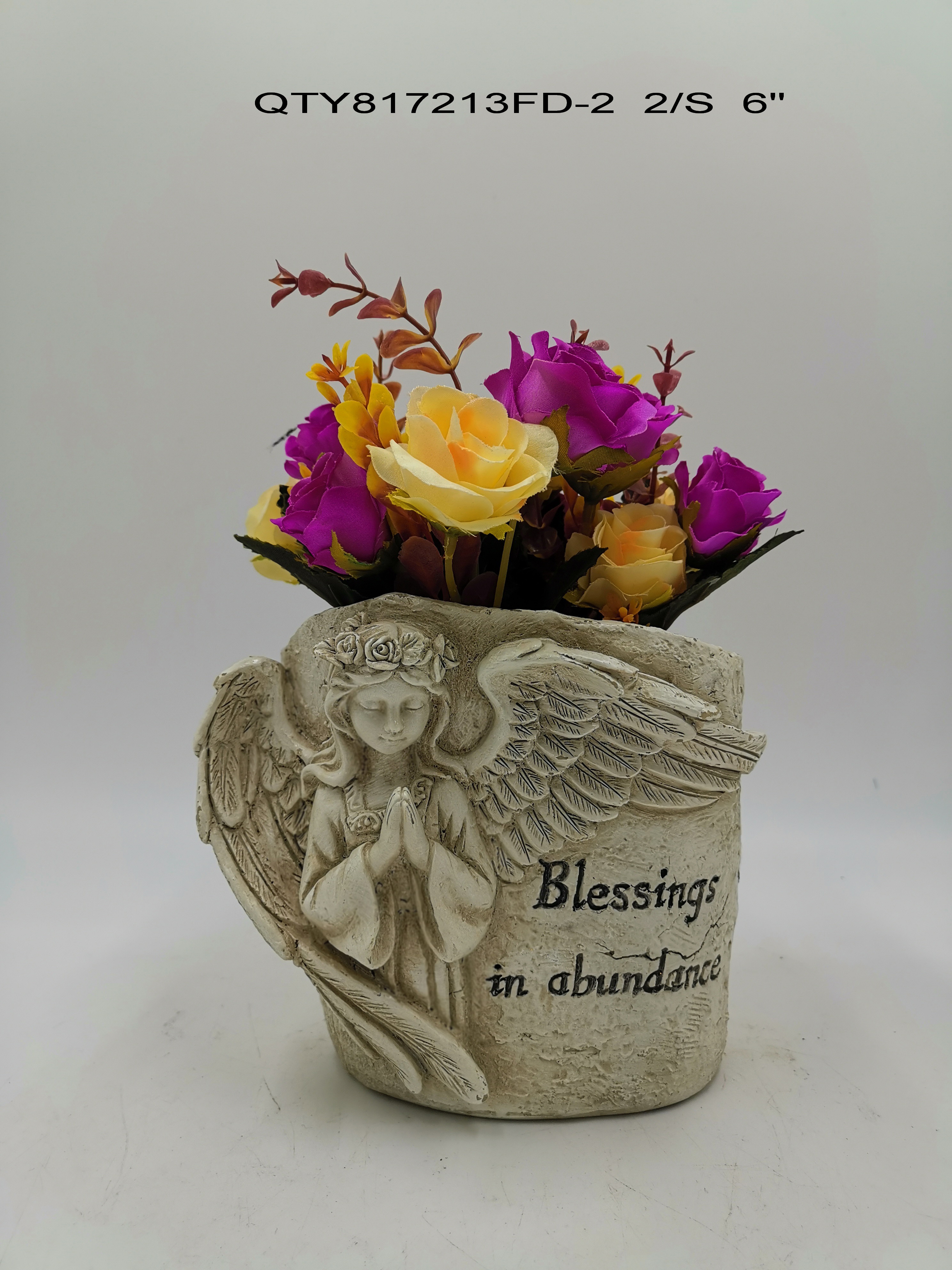 Garden decorations the cemetery Angel with flower pot