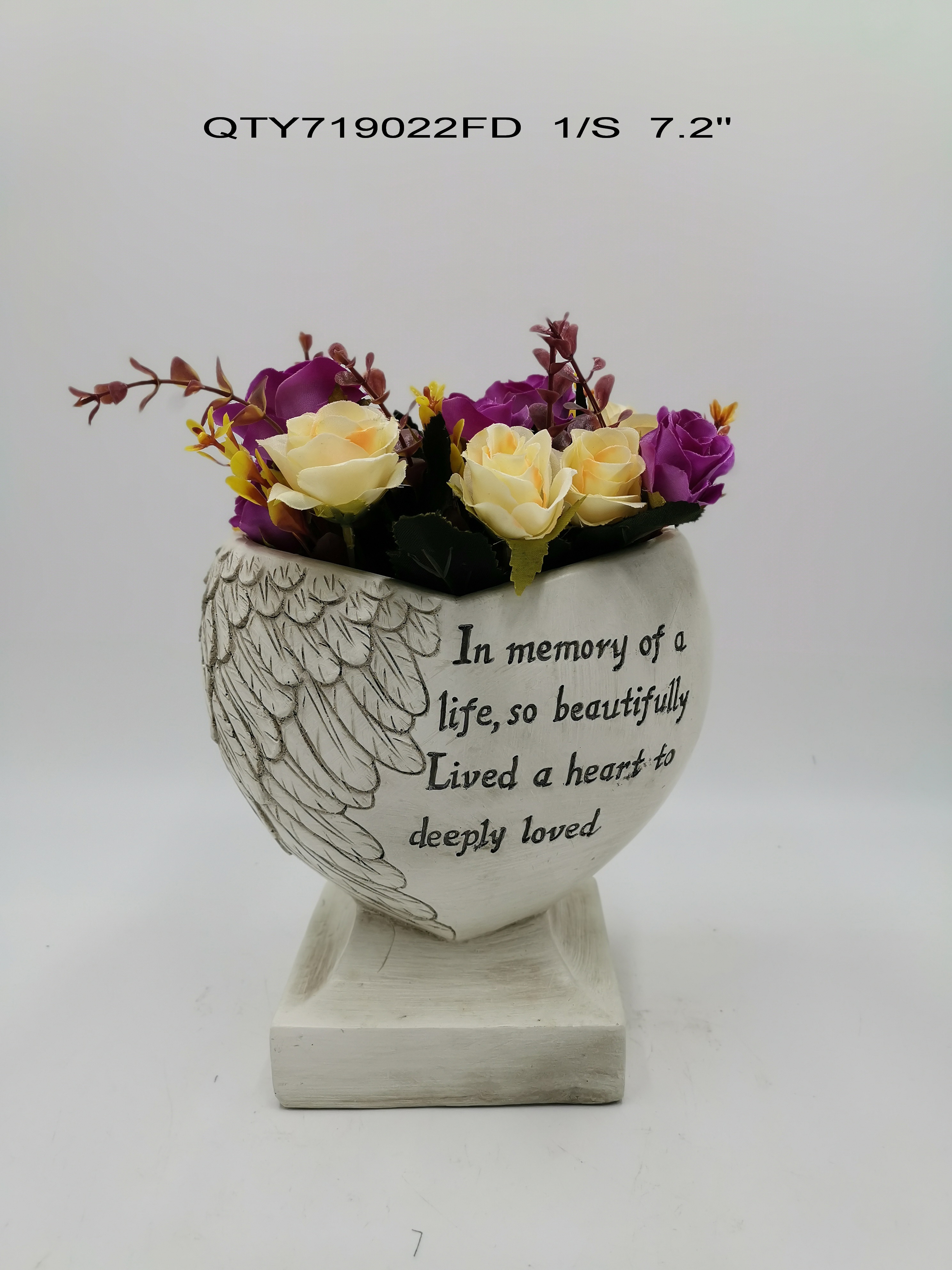 Garden decorations the cemetery Angel with flower pot