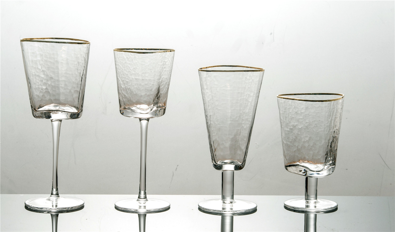 Trangle hammered wine glasses with gold rim