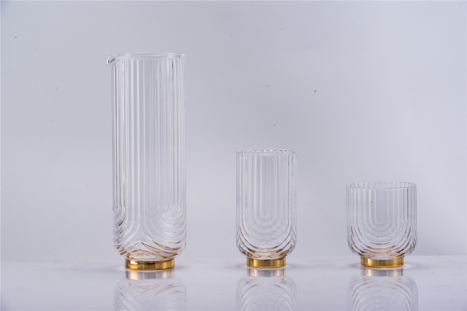 Ribbed and gold plated glass vases