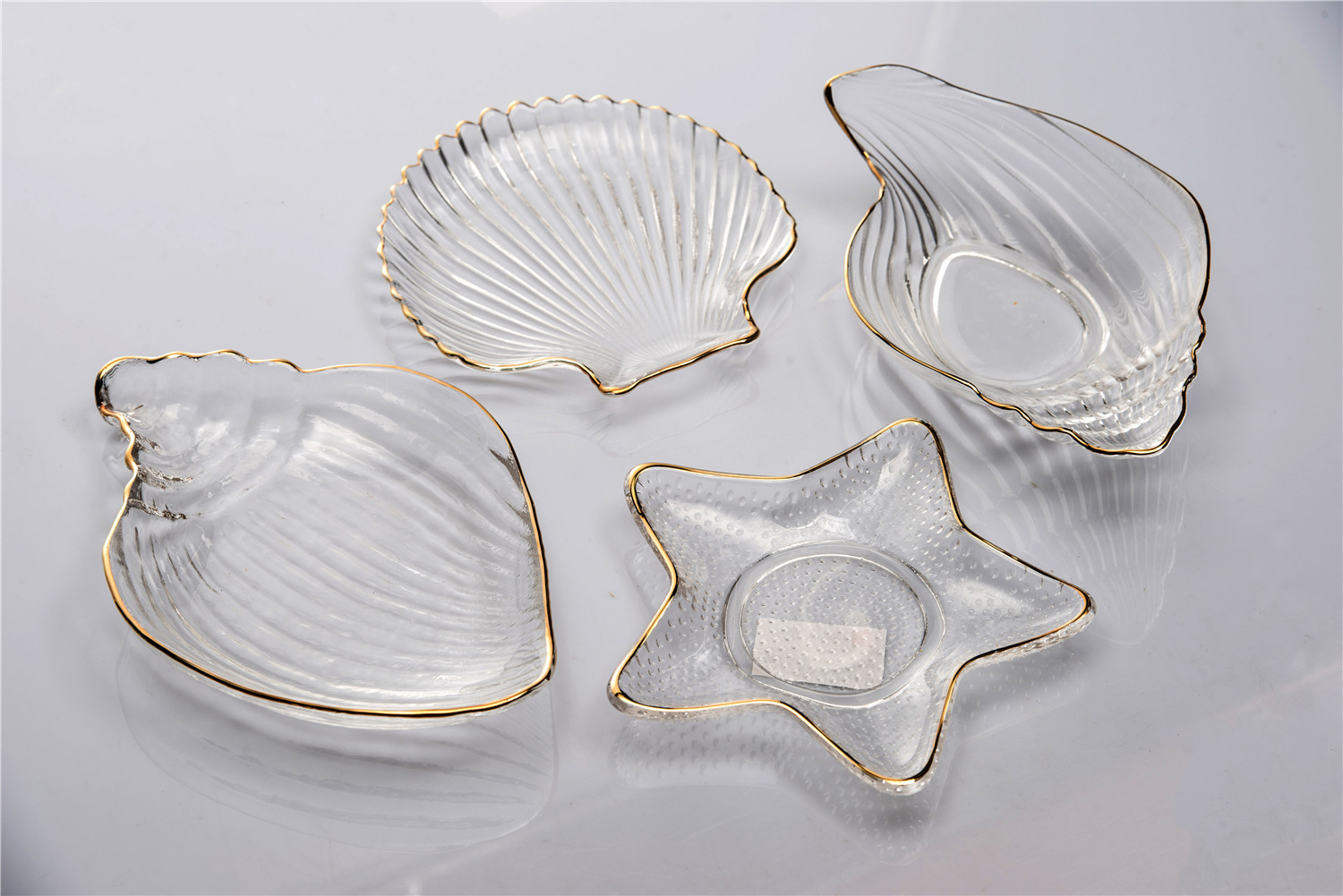 Ocean shape plate with gold rim