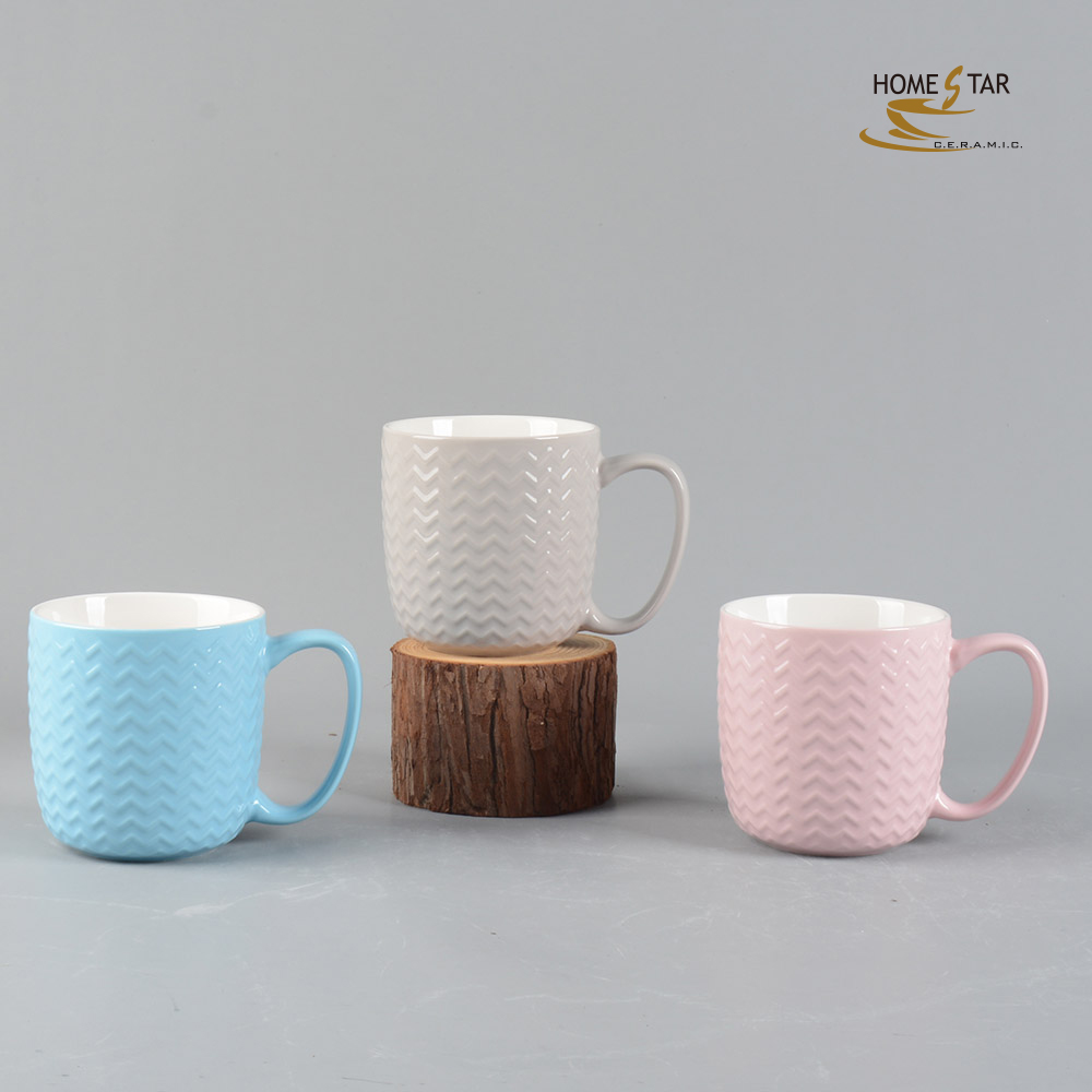 New bone china glaze embossed mug