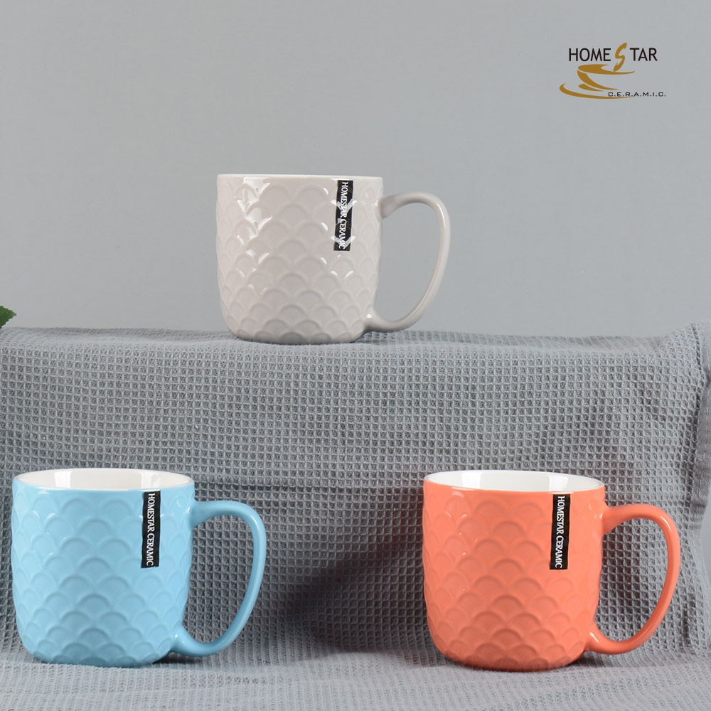New bone china glaze embossed mug