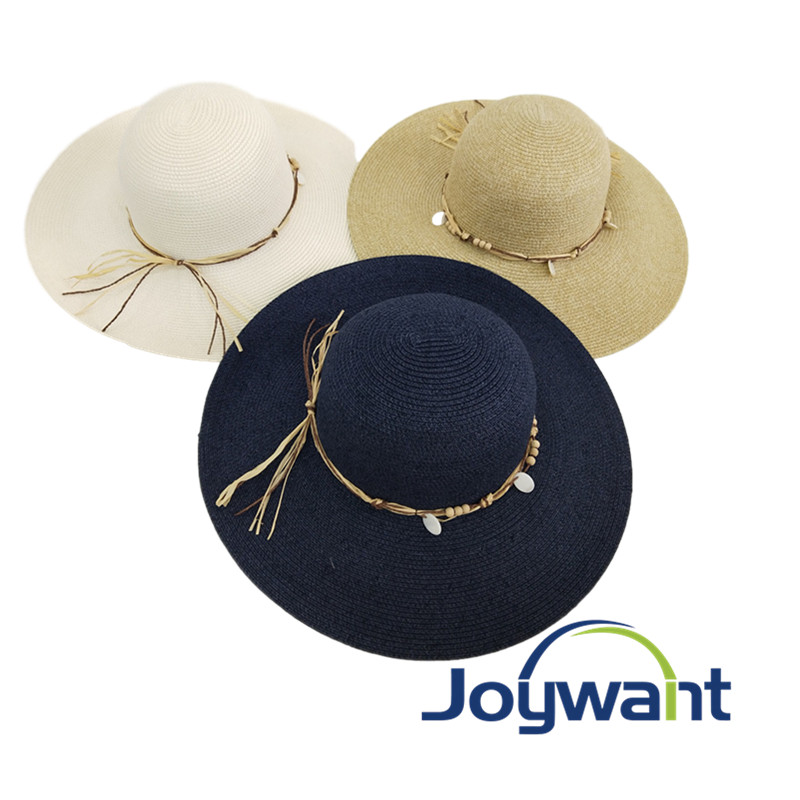 Elegant round crown Capeline sun hat with decorative trim.