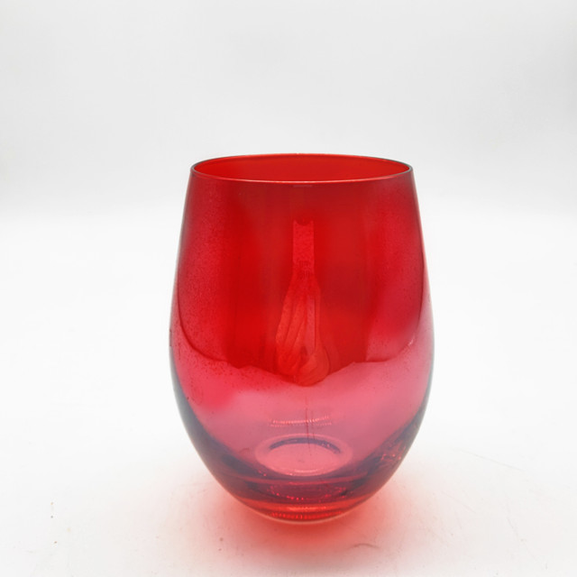 red stemless wine glass