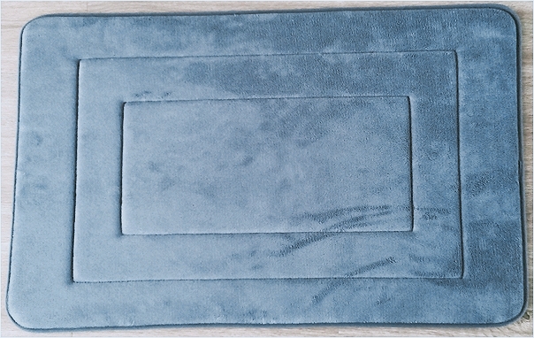 Embossed bath mat
