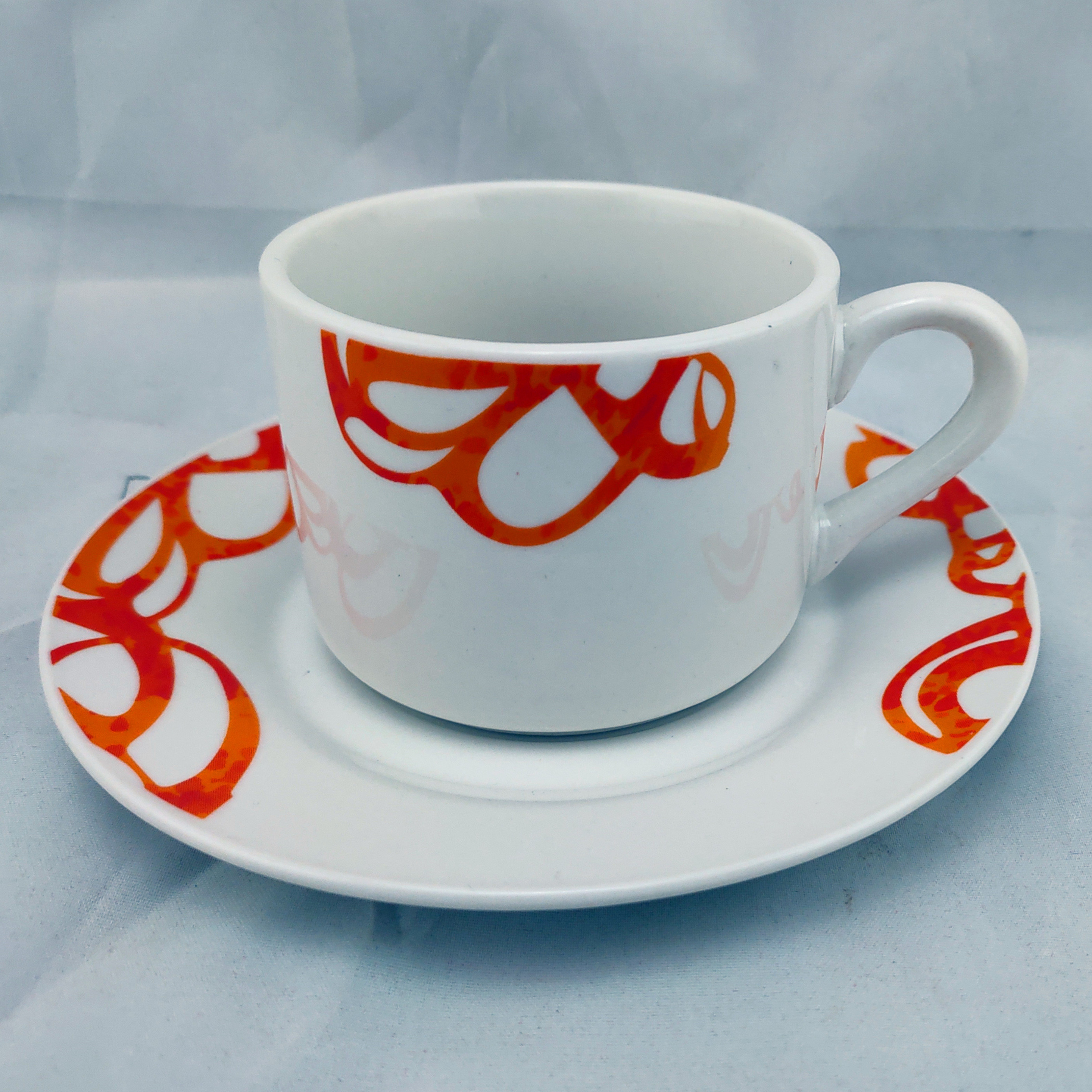 Porcelain Mugs & Saucers