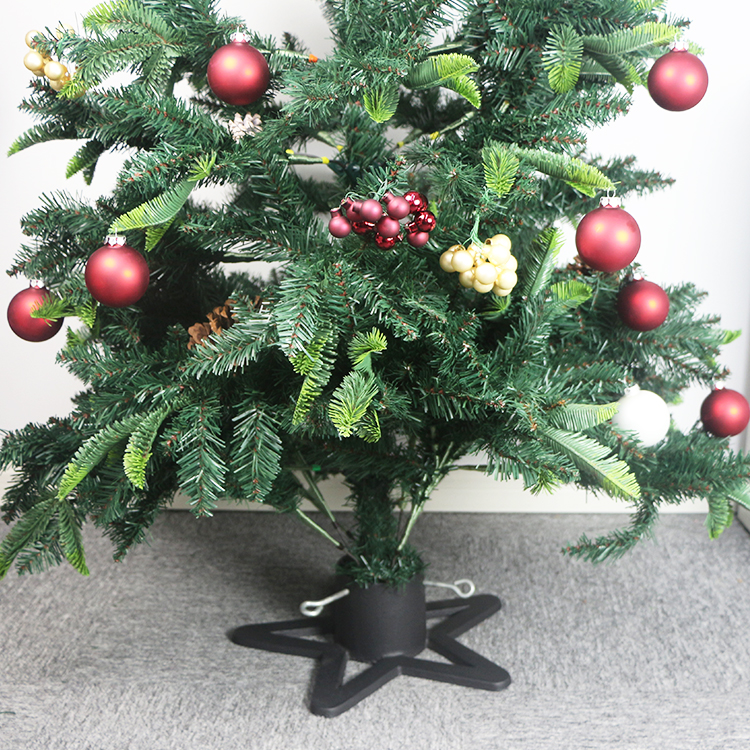 Cast iron Christmas tree stand in star shape