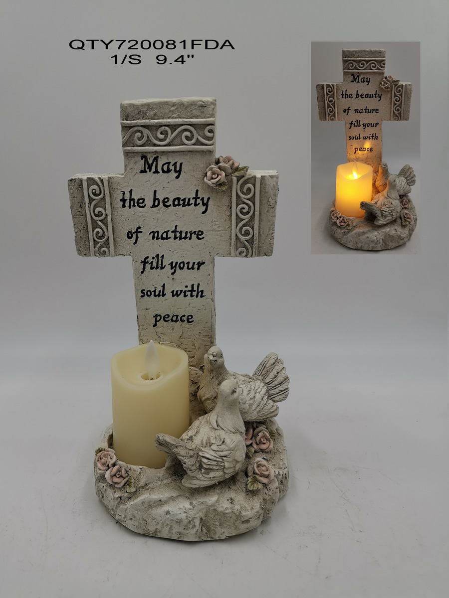Cemetery cross with candle