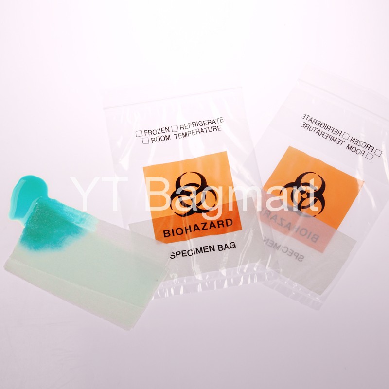 Biohazard specimen bag with absorbent pad