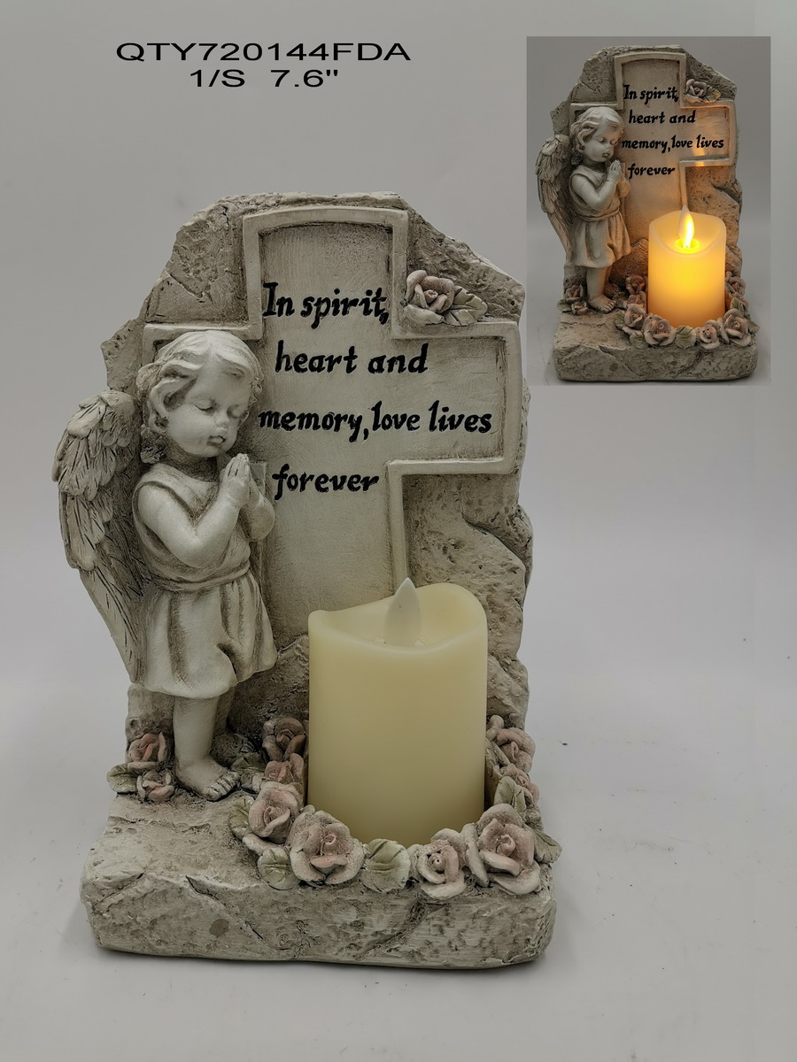 Cemetery angel with candle
