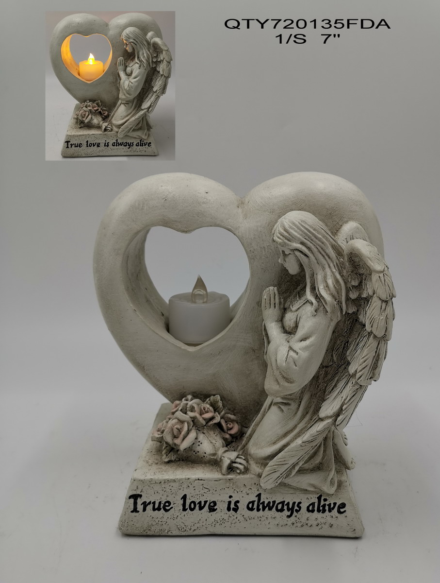 Cemetery angel with candle