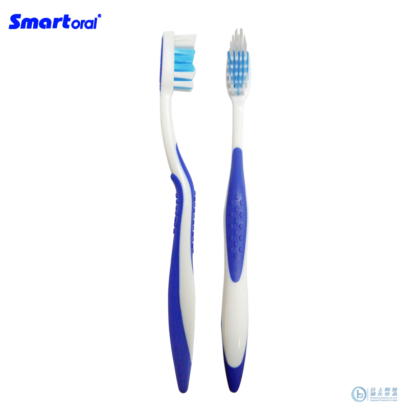 Adult plastic toothbrush with tongue cleaner and big tufts