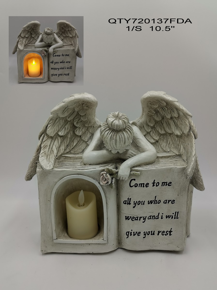 cemetery angel with candle