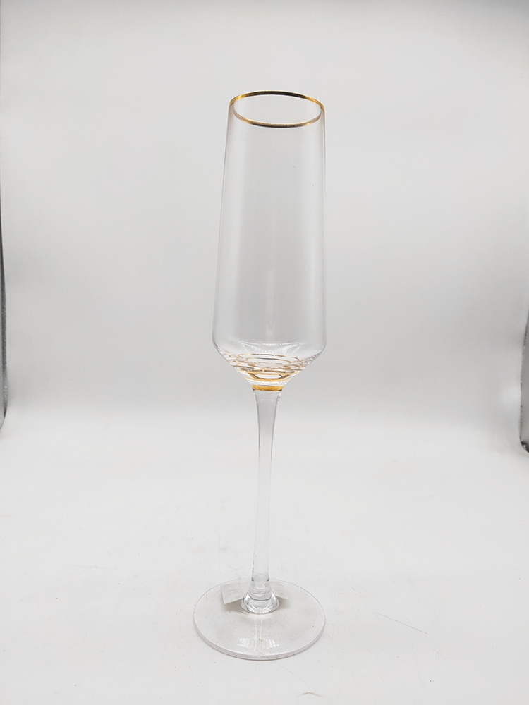 Slant champagne flutes with gold rim