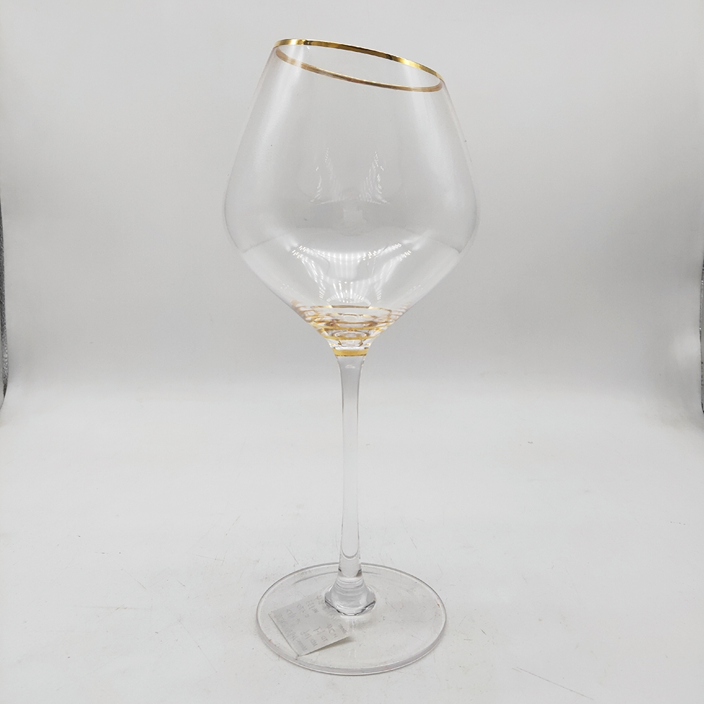slant wine glass with golden rim