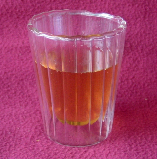 Double wall cup with strips