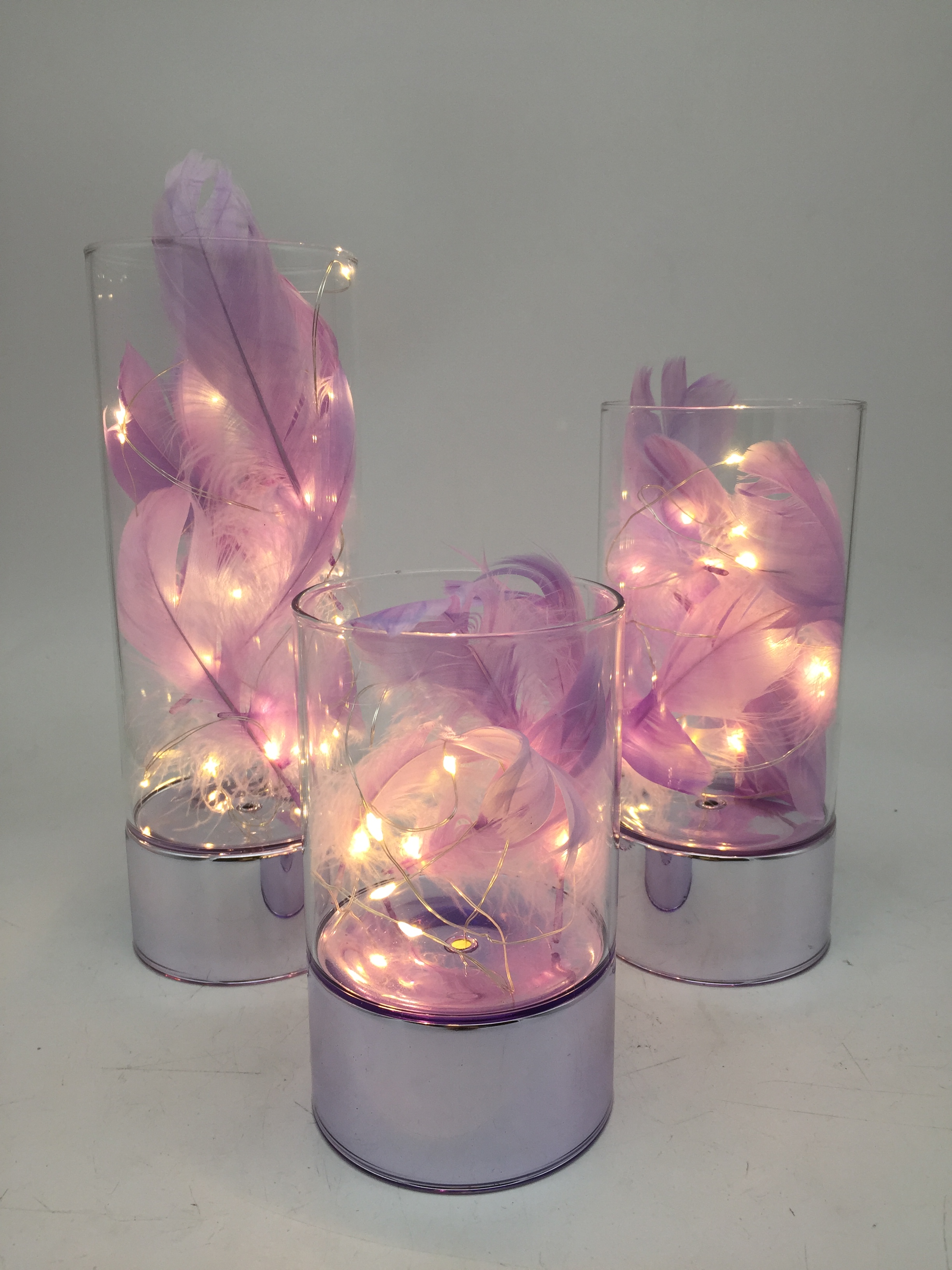 LED Silver Base Clear Glass Cylinder Hurricane With Colored Feather Deco