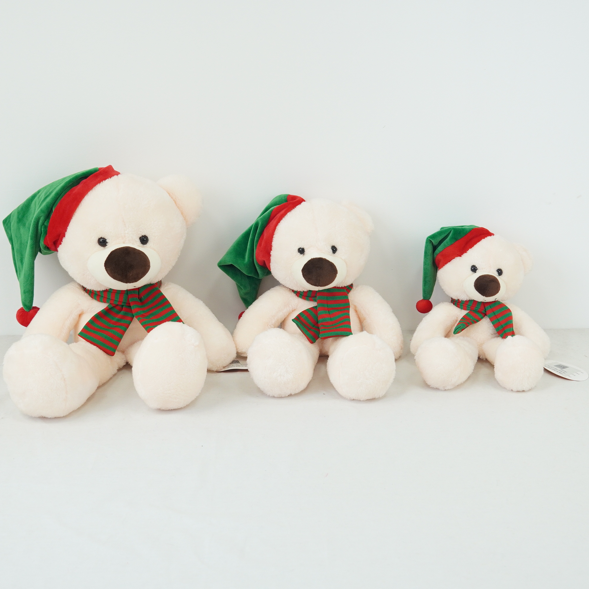 Cream bear with Christmas hat and scarf