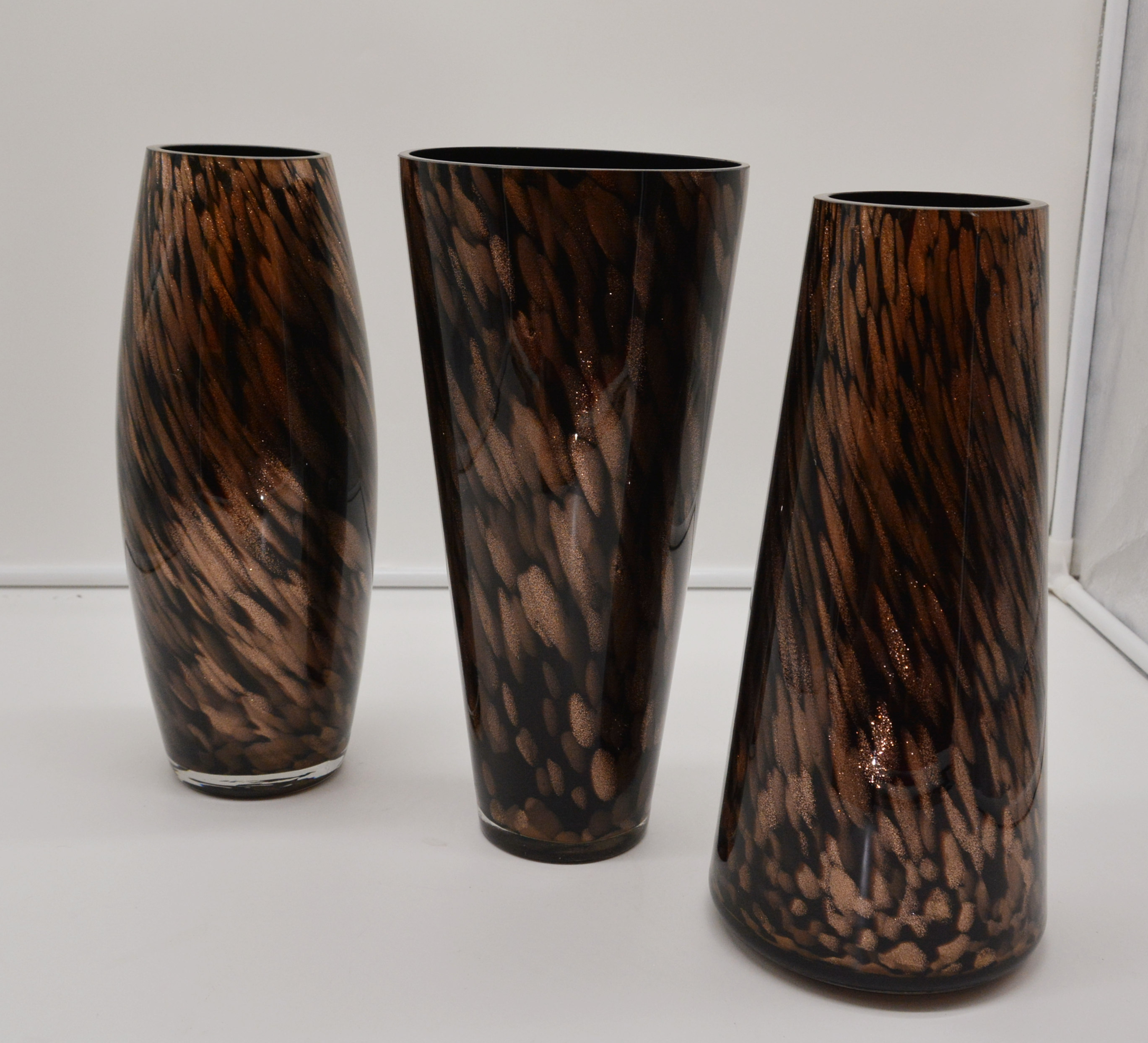Primary black glass vase with gold dust
