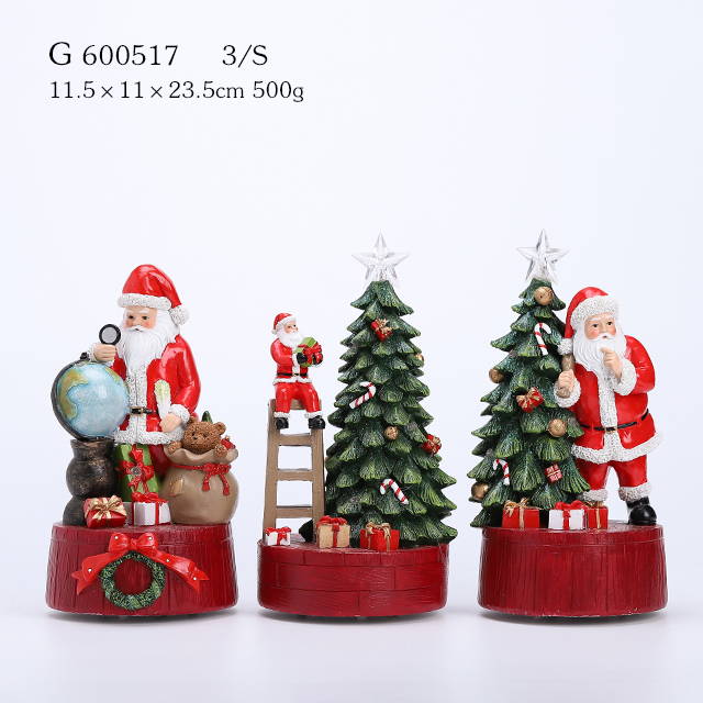 • Santa With Tree Music Box plays melody We Wish You A Merry Christmas