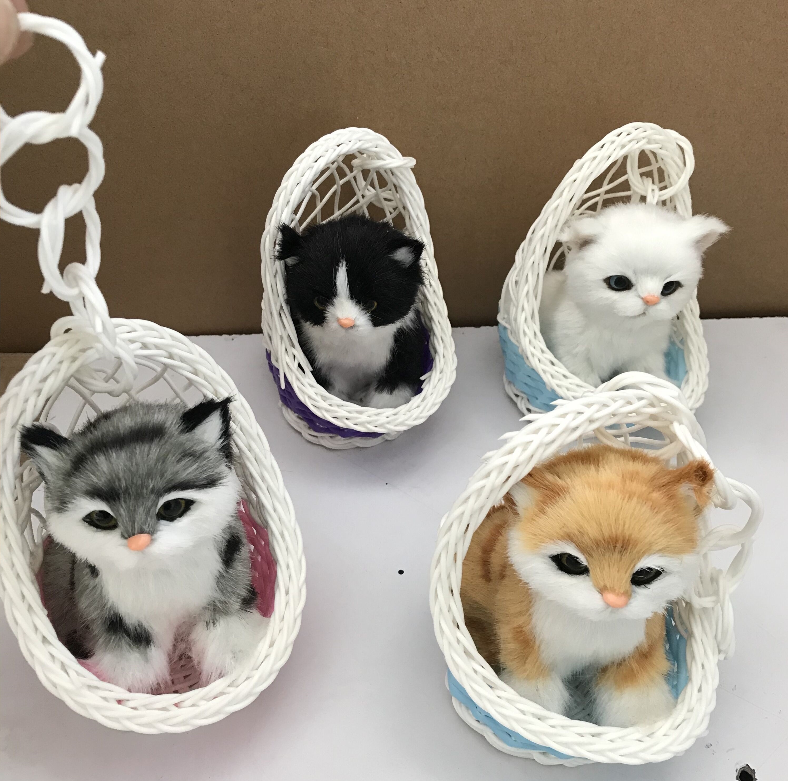 Lifelike animal in hanging basket