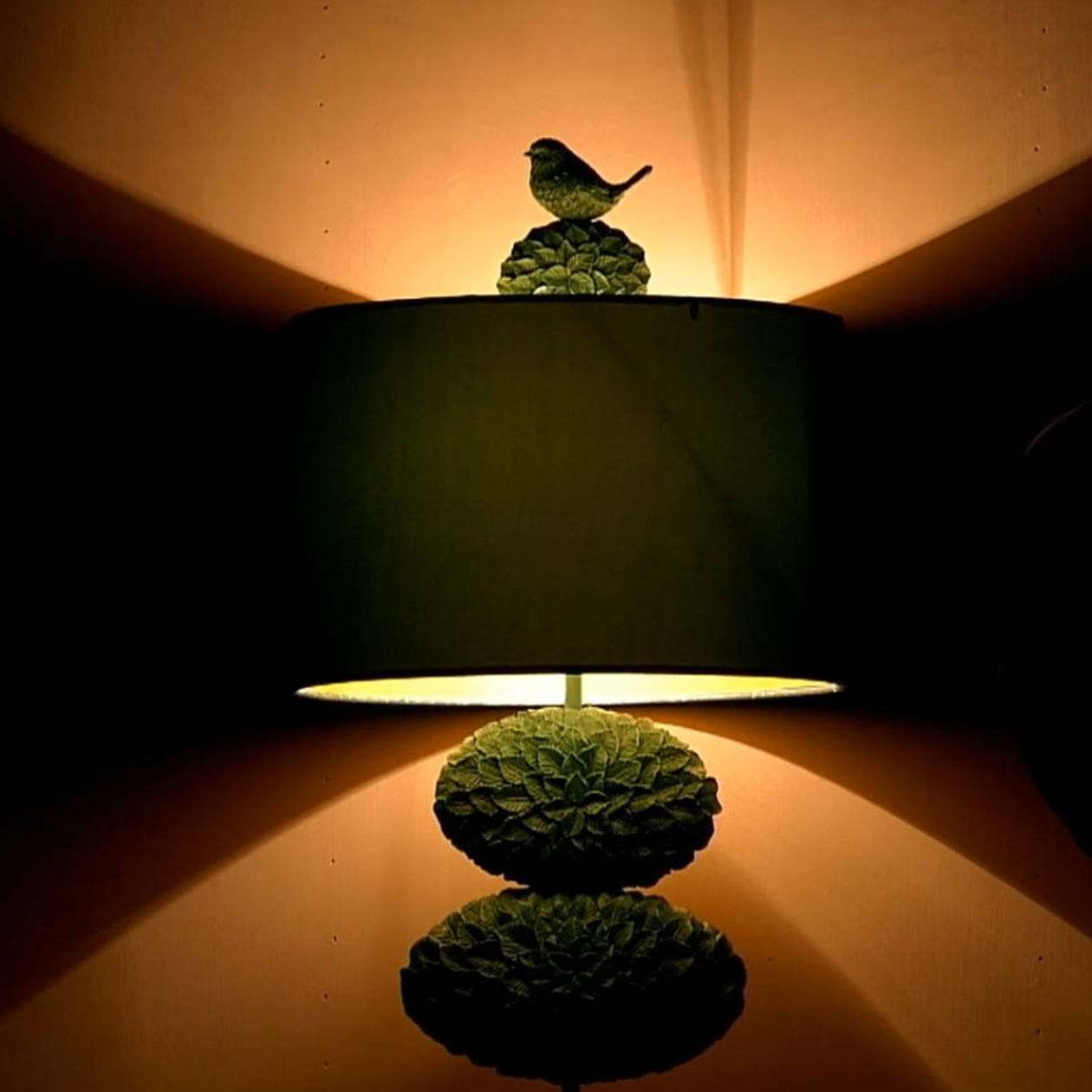 Bird on tree lamp