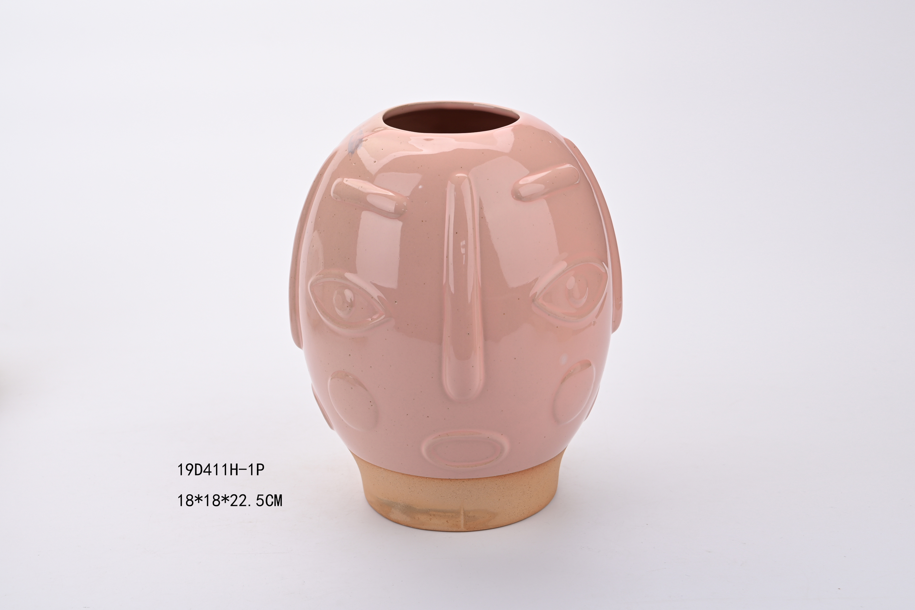 Reactive glazed face follower pot