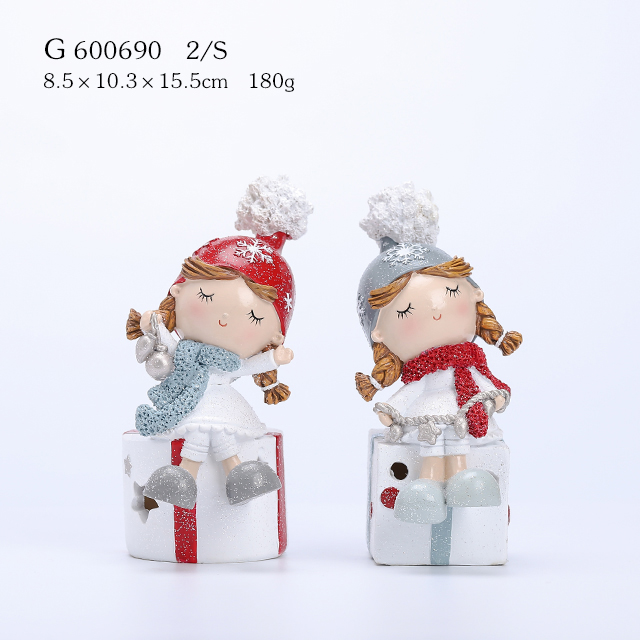2/A Polyresin Xmas Girl Sitting On Gift Box With LED Light