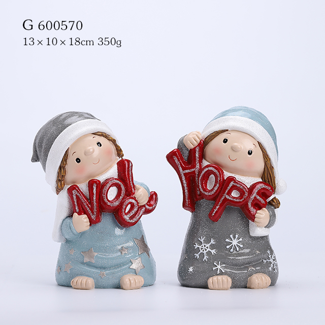 2/A resin boy and girl figurine