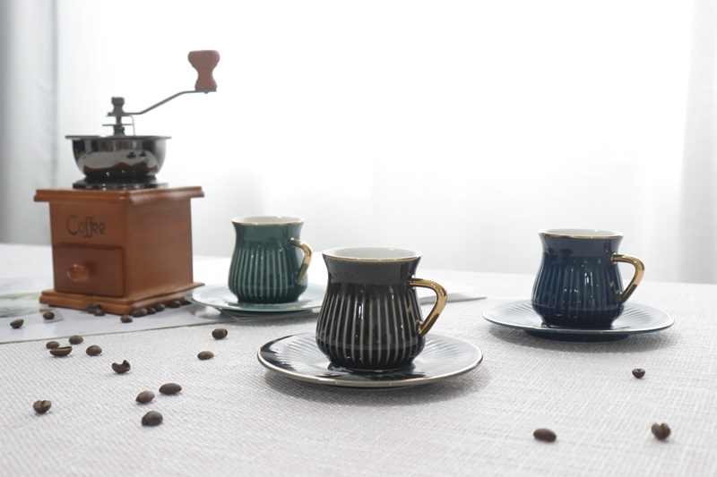 Coffe cup and saucer glaze with gold