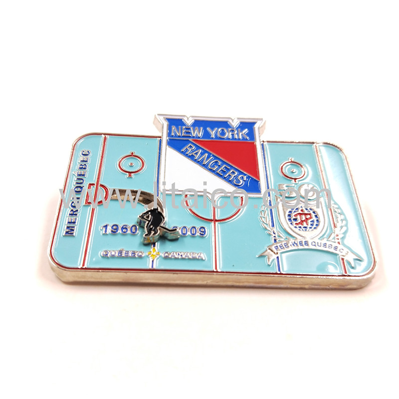 Sports style metal badge