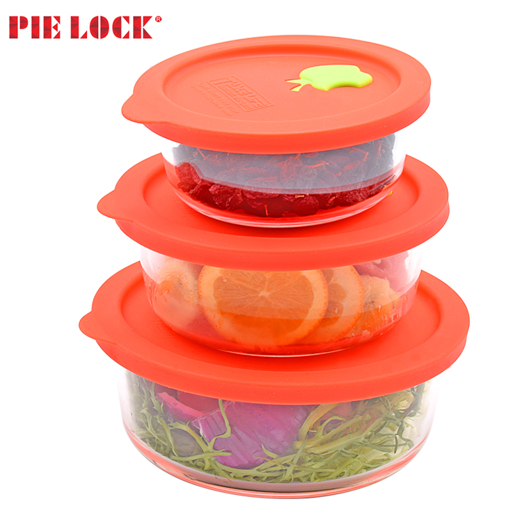Round glass food storage container with silicone lid