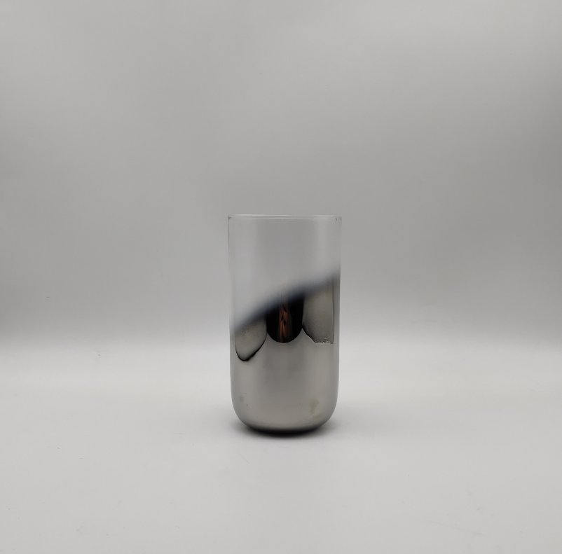 Tall cup with oblique plating