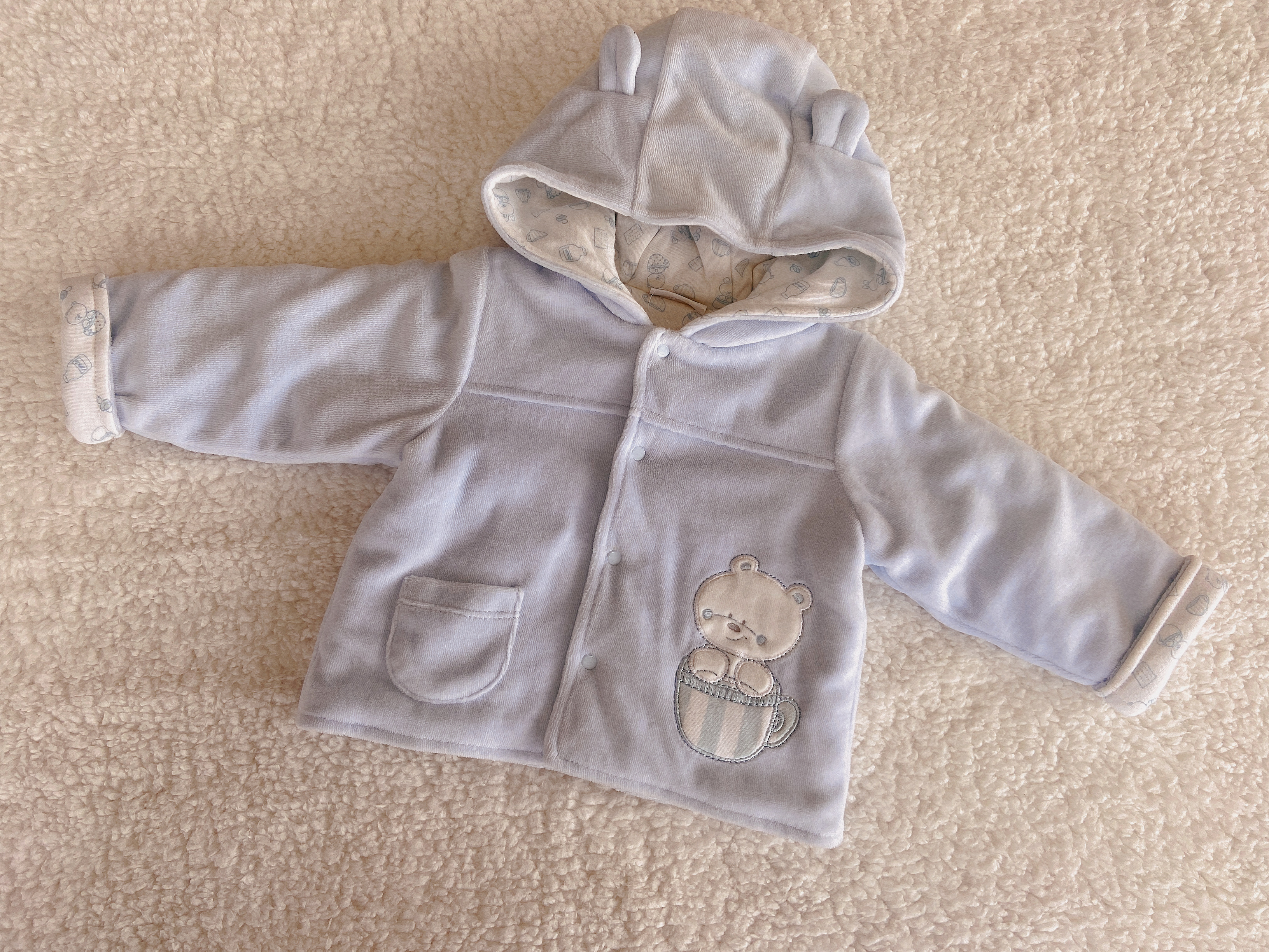 Baby jacket with hat