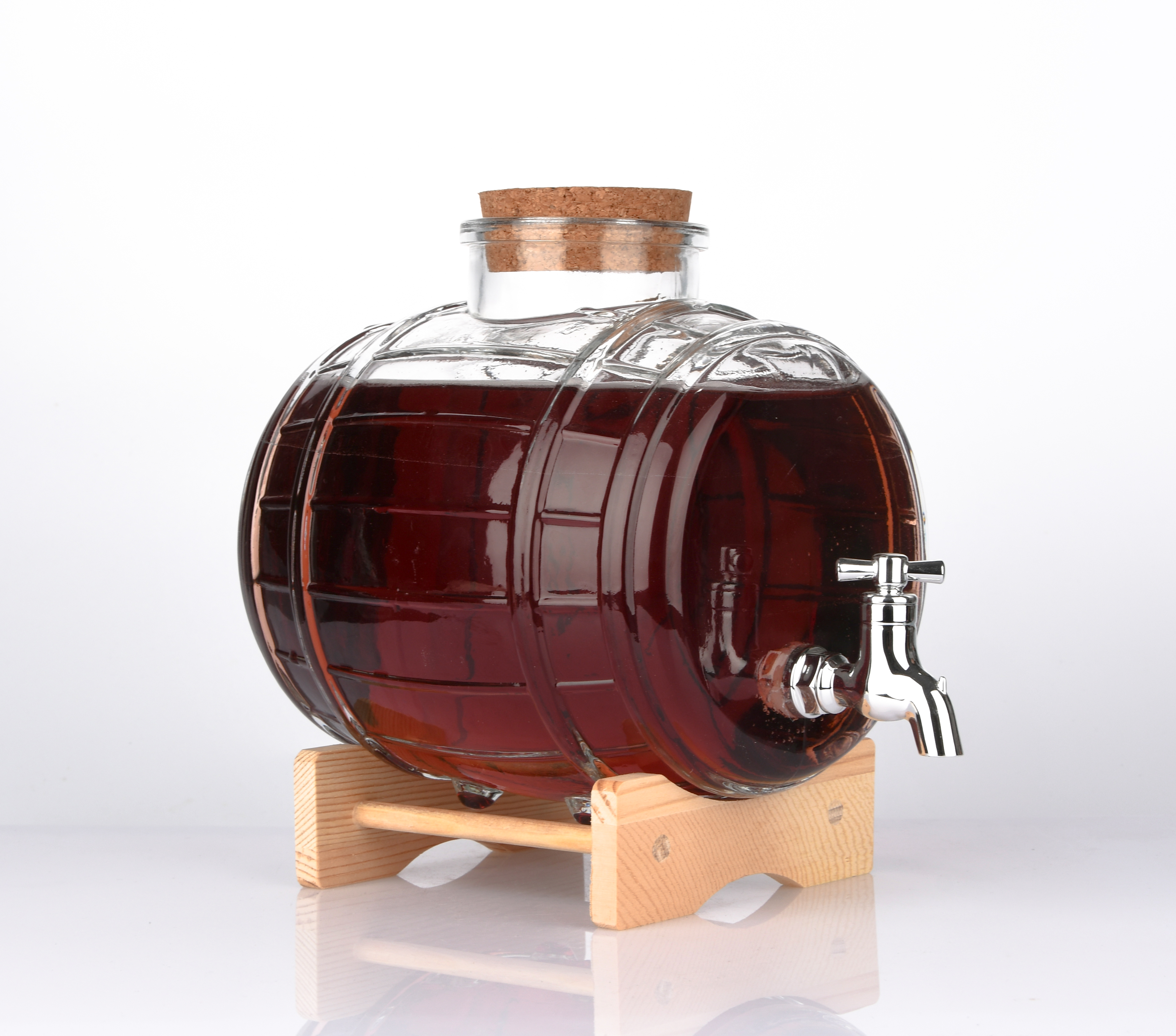 A cask shaped bottle for whiskey