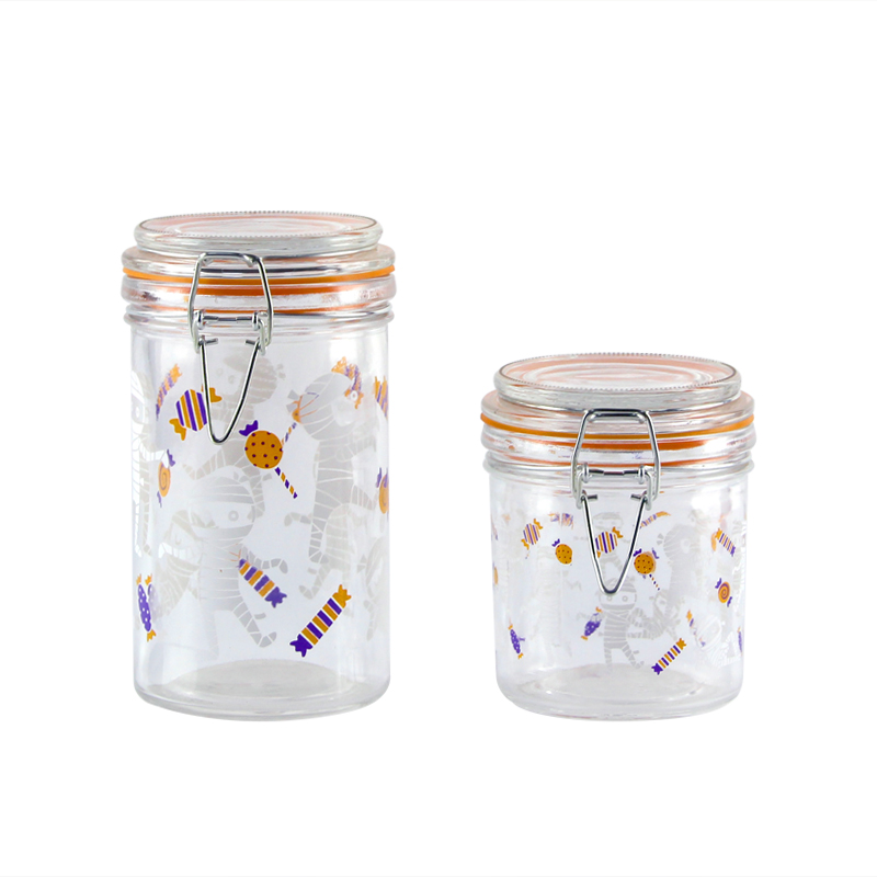 Glass canister with decal