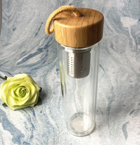 Hot selling high borosilicate double wall glass bottle 500ml with stainless steel filter and bamboo lid for home using EU standard ODM OEM