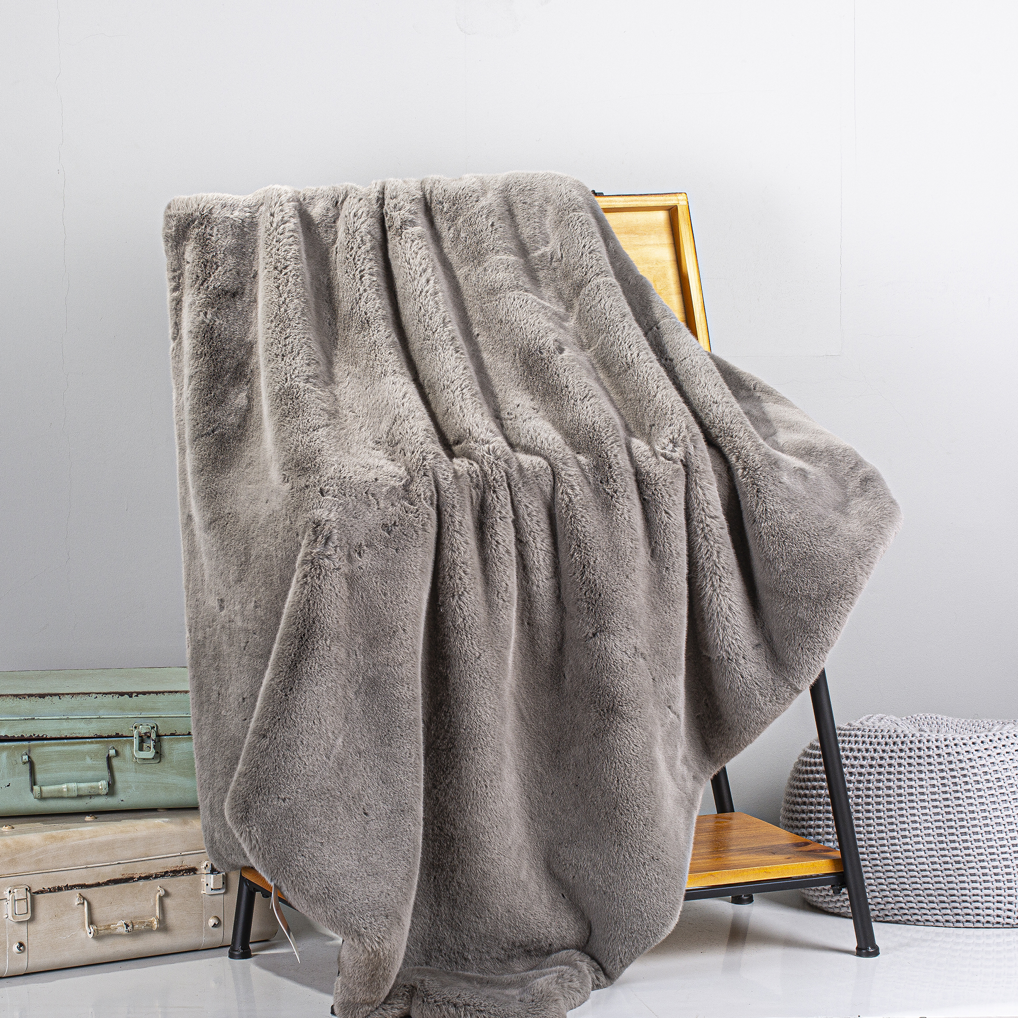 Solid color faux rabbit fur throw