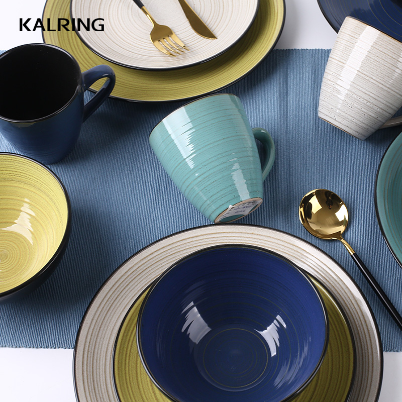 Tableware with ceramic mug bowl and plate with colro galze with color rim with embossed body