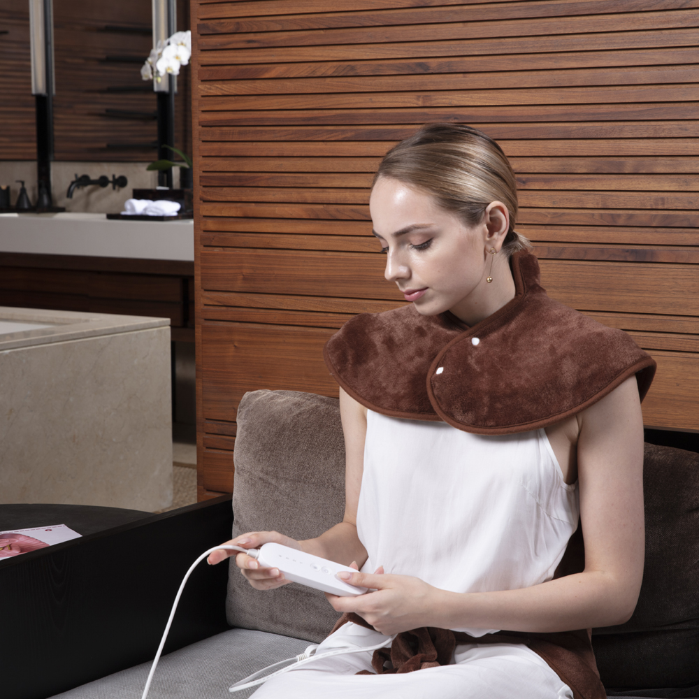 Heating pad for shoulder and back