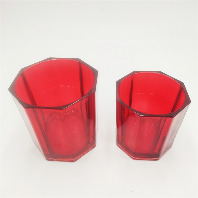 Red color hexagon shaped glass candle jar
