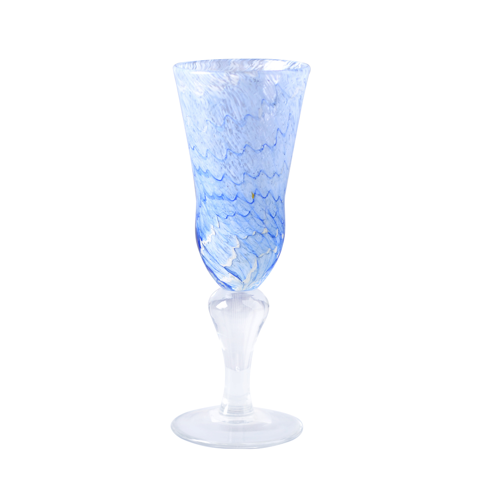 Champagne glass in blue colour with water ripple ,glass cup