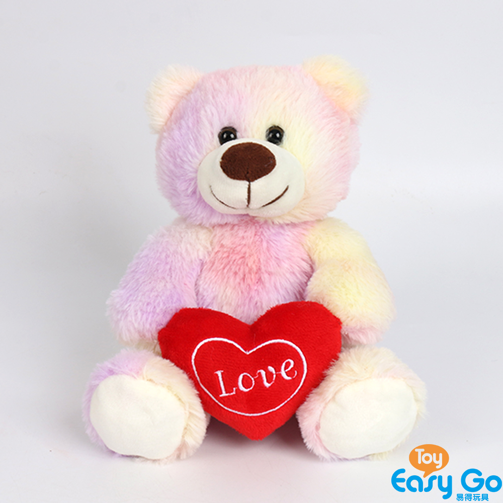 Valentine plush toy hold the heart pink teddy bear
