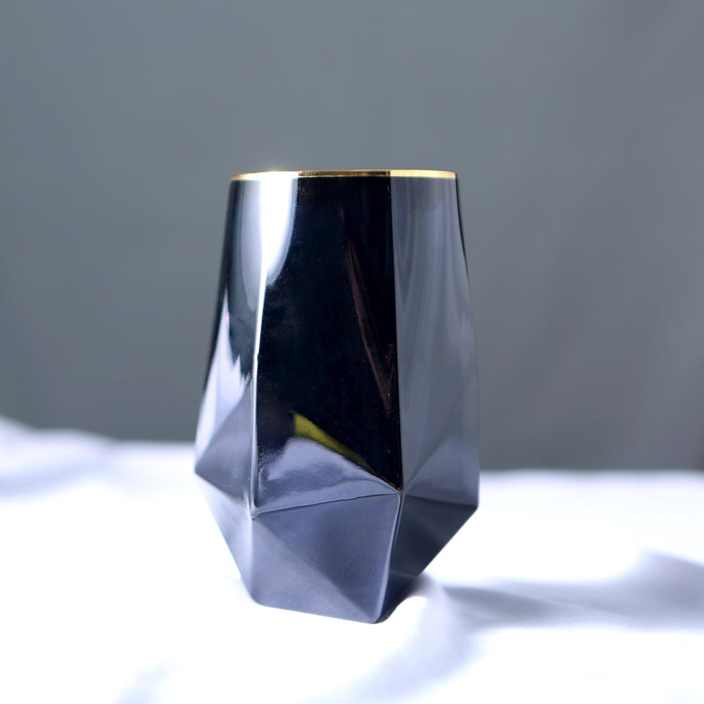 Black diamond with gold rimmed whisky glass, juice glass