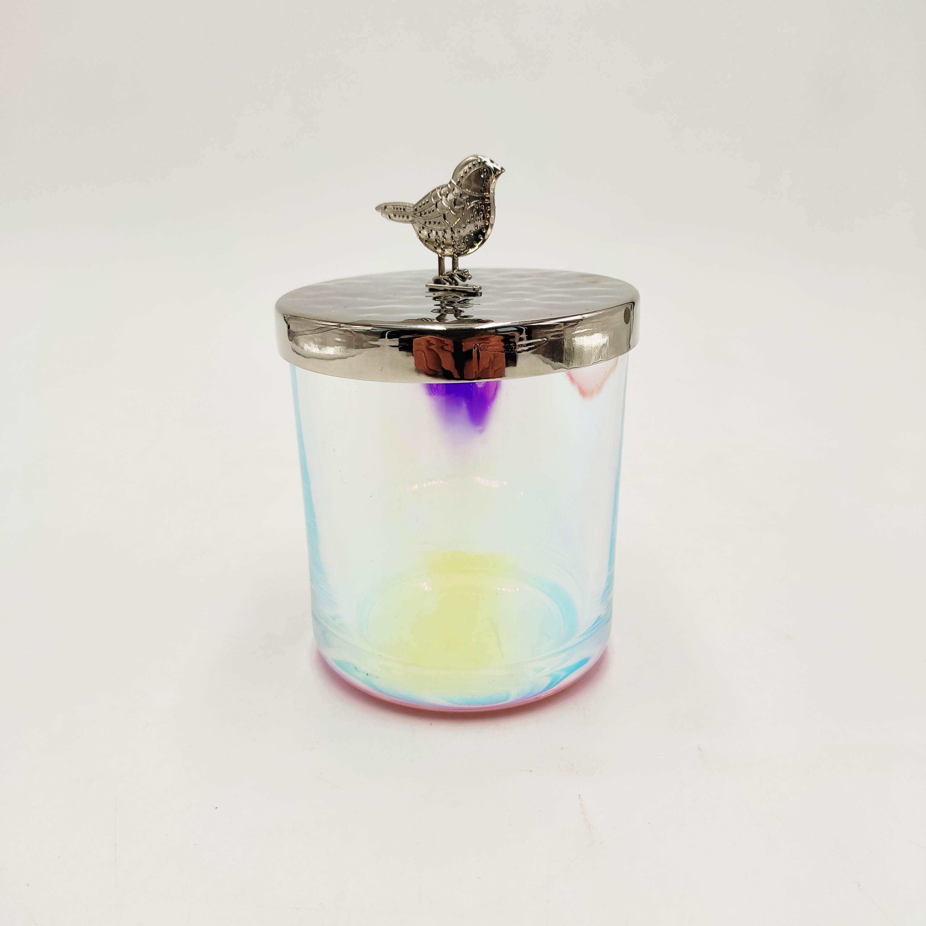 Iridescent color glass candle holder with bird metal lid