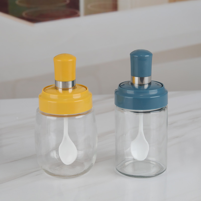 Glass spice jar with spoon