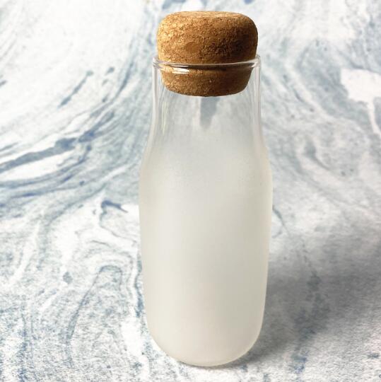 Hot Selling high borosilicate glass water bottle with cork lid and frosted effect for home using EU standard ODM OEM Dishwasher Safe LFGB