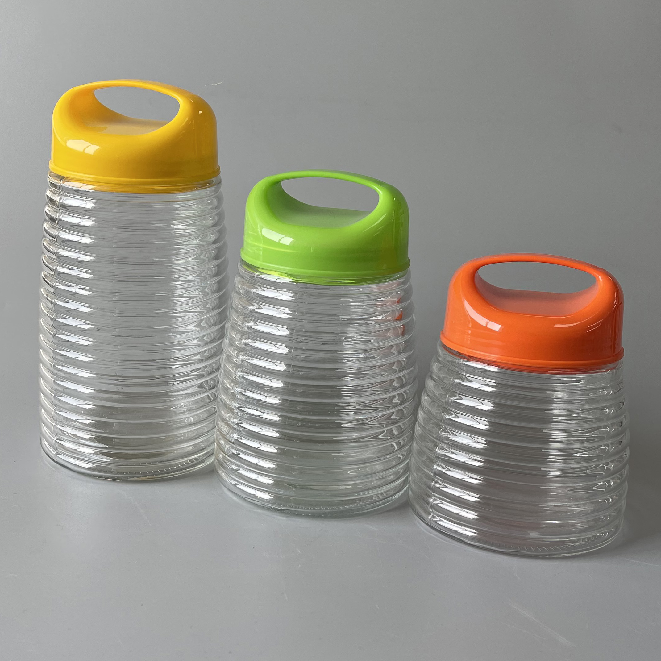 Plastic lid glass canister