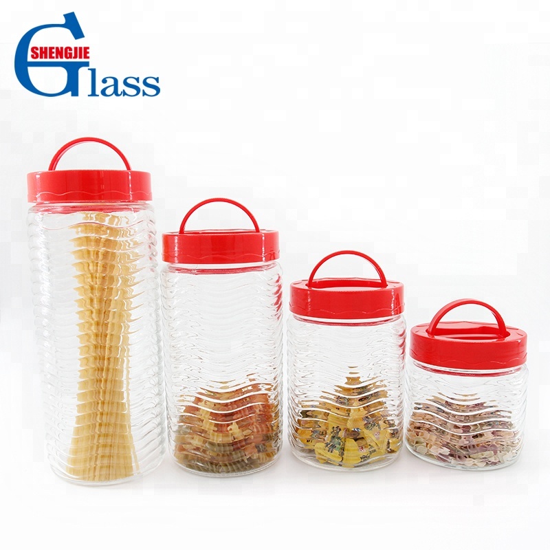 Wave Design Glass Storage Jar With Plastic Lid Handle